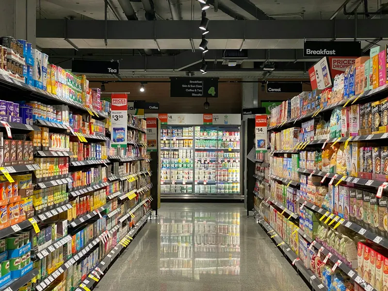Store aisle with fully stocked product shelves